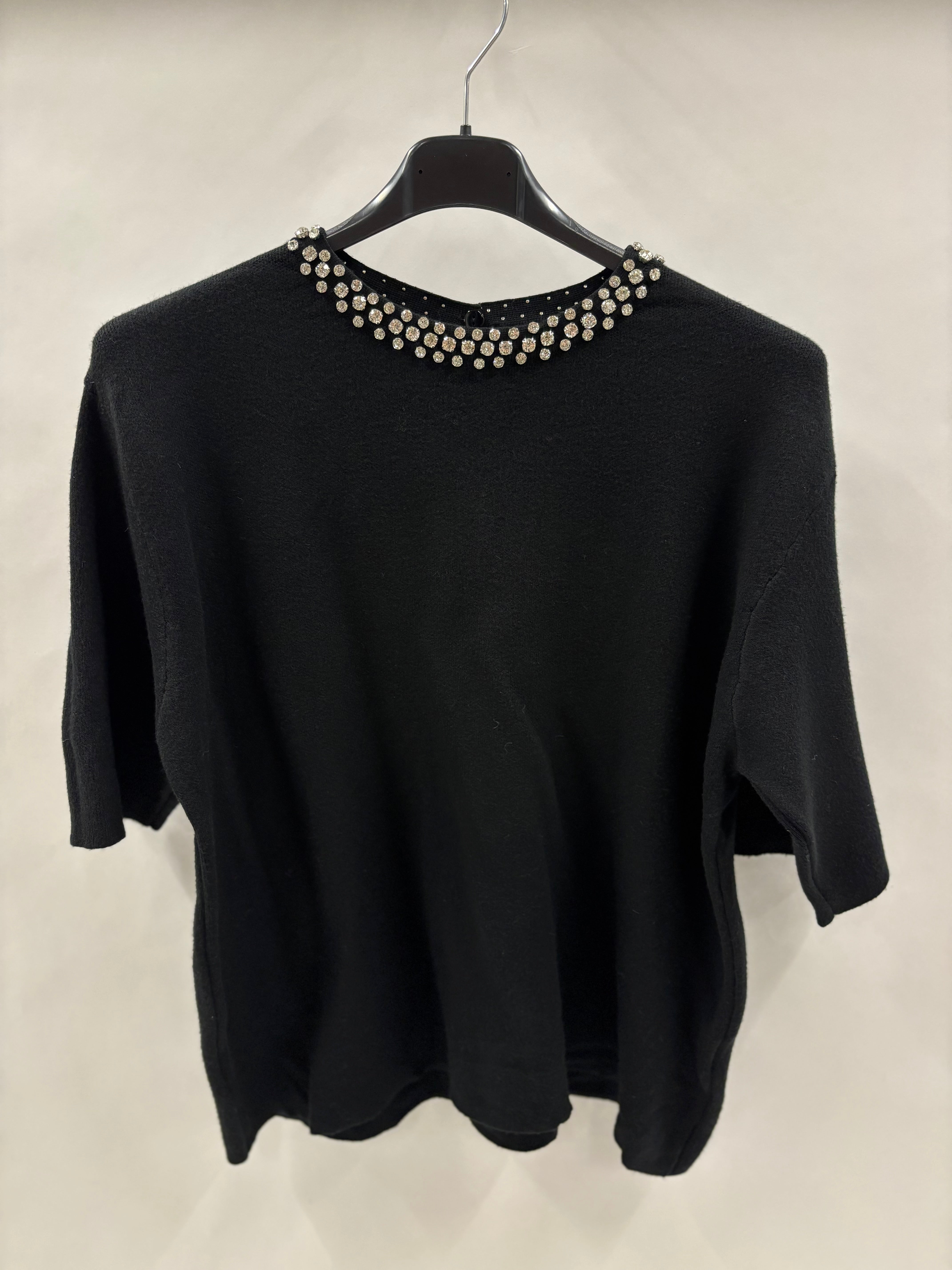 Strikbluse, Blinghals