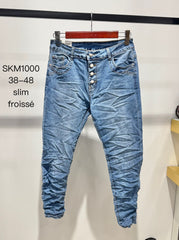Jeans med bling knapper
