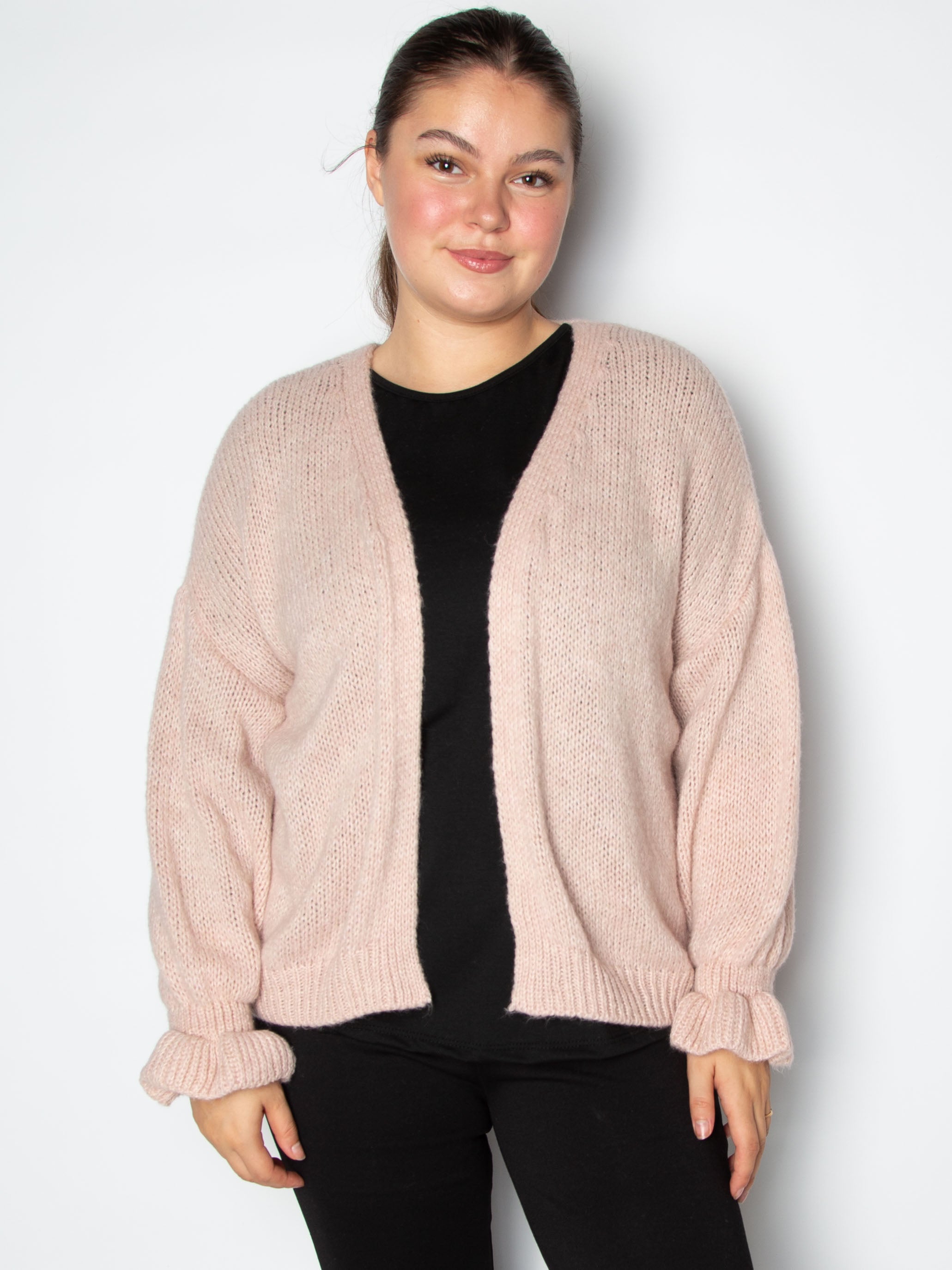 Kort cardigan med flæsekant
