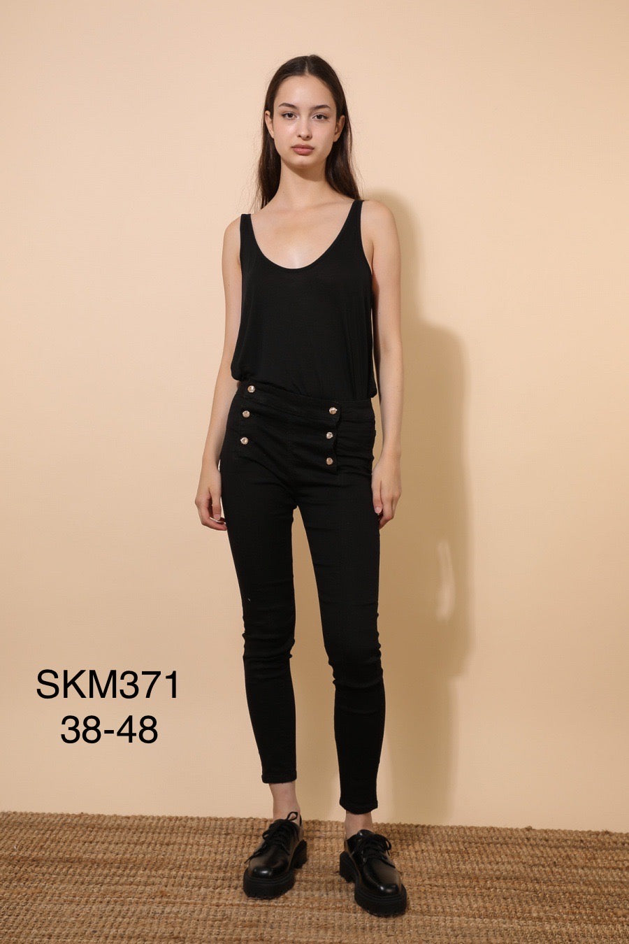 Jeans med guld knapper sort by Krone 1