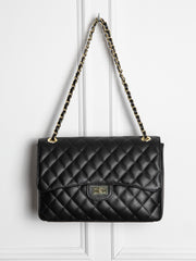 Quilted leather bag with gold details