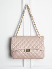 Quilted leather bag with gold details