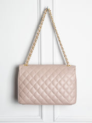 Quilted leather bag with gold details