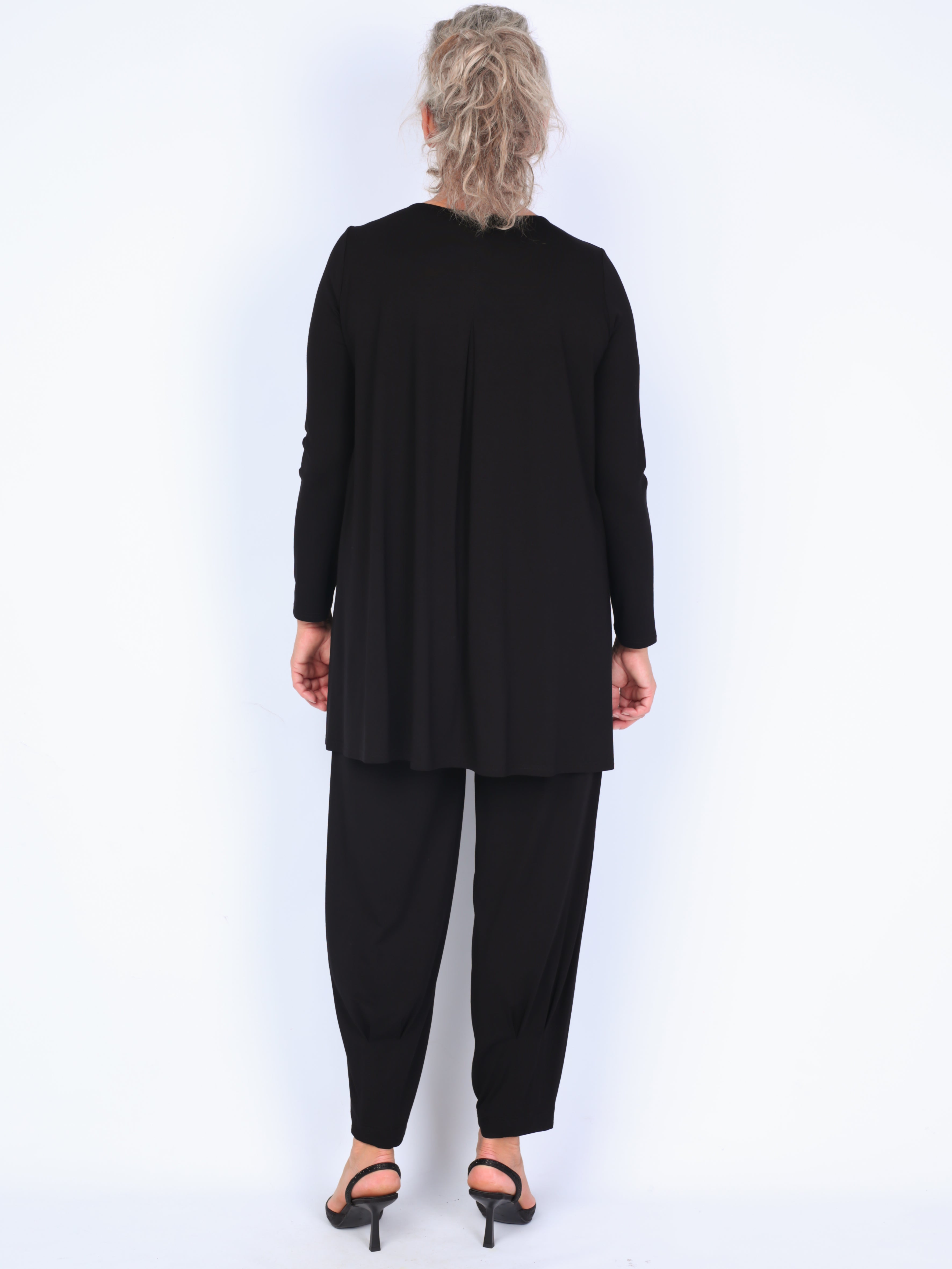 Some long blouse with pleats in the back