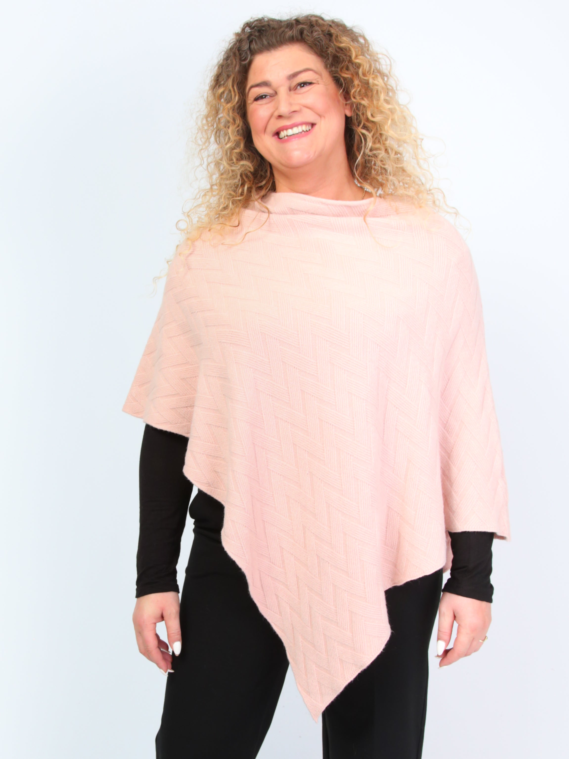 Krone 1 knitted poncho with zigzag