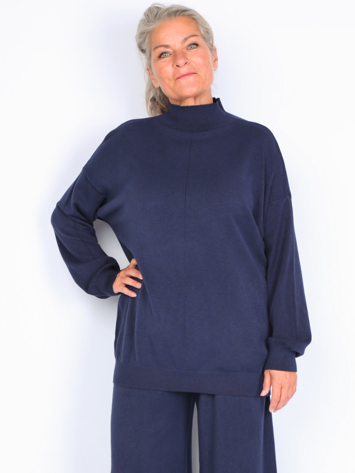 Knitted sweater with high neck