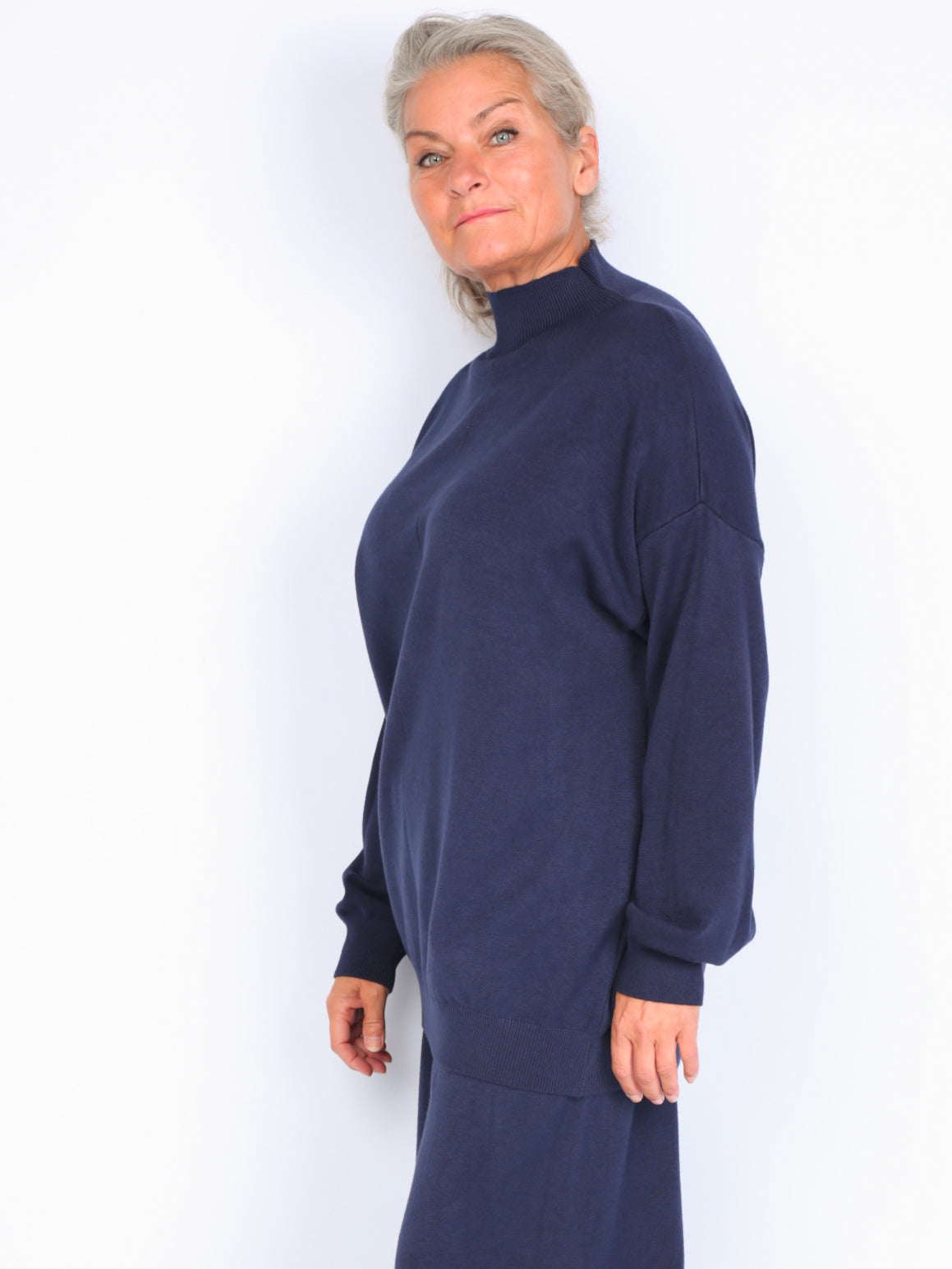 Knitted sweater with high neck