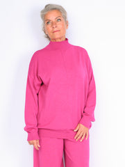 Knitted sweater with high neck