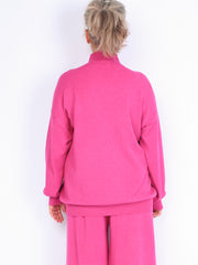 Knitted sweater with high neck