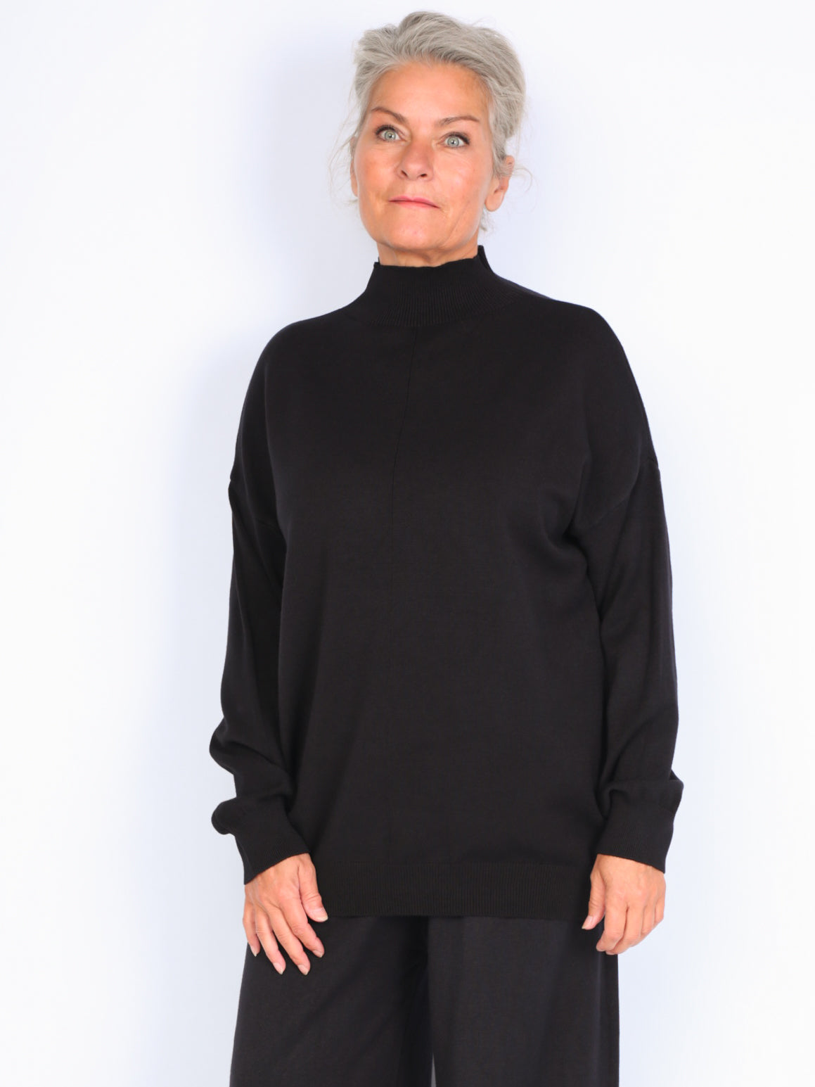 Knitted sweater with high neck