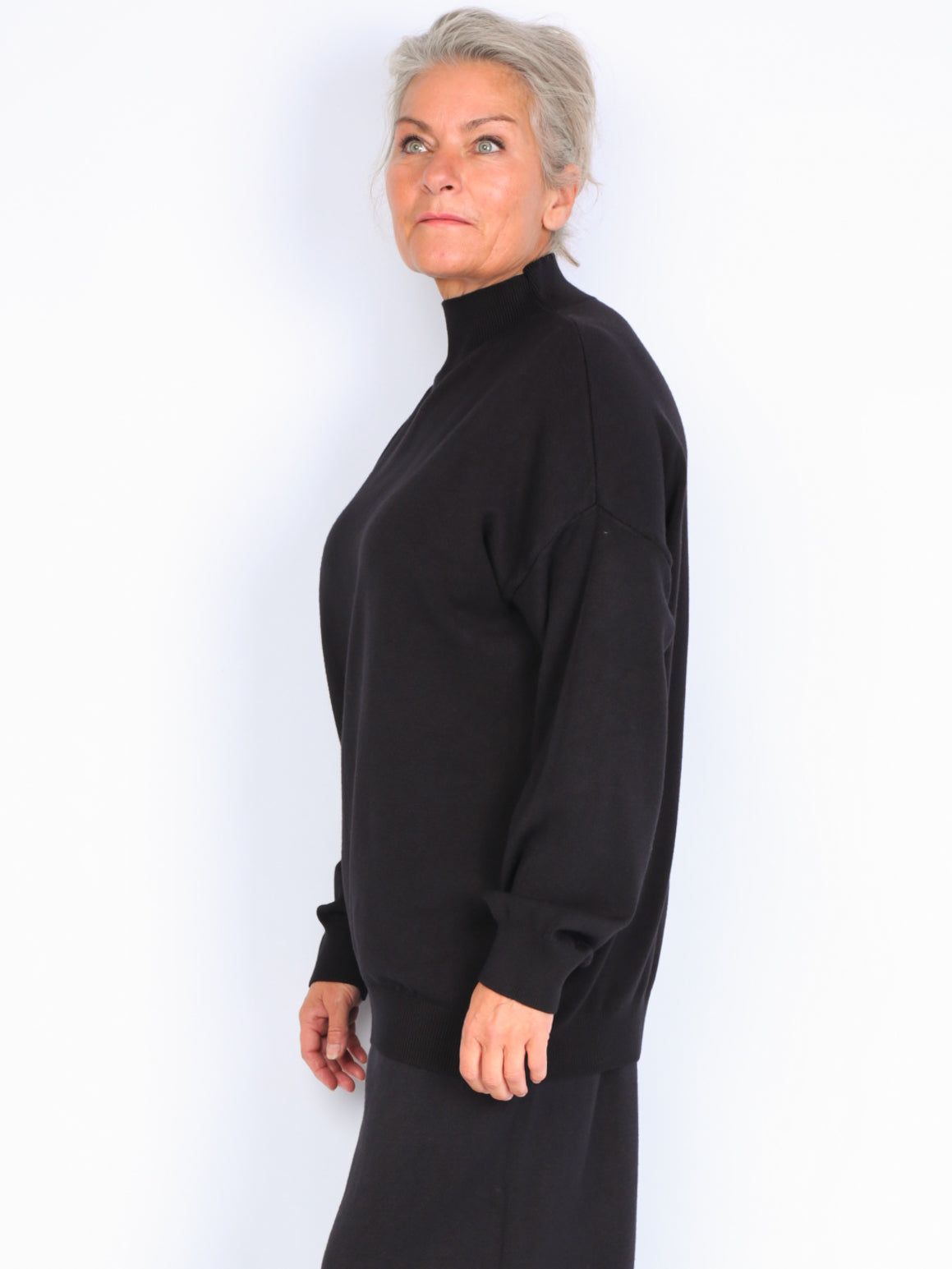 Knitted sweater with high neck