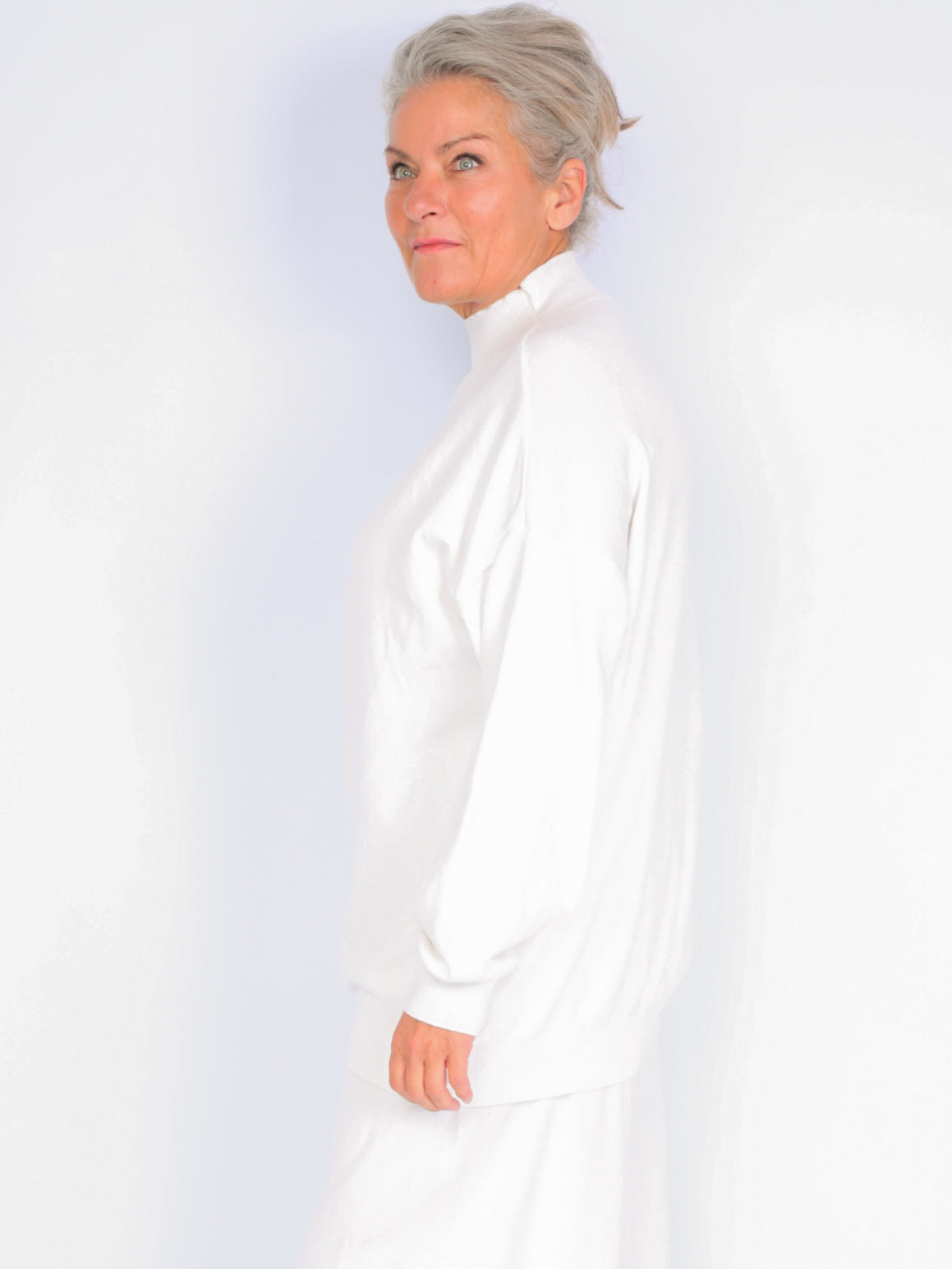 Knitted sweater with high neck