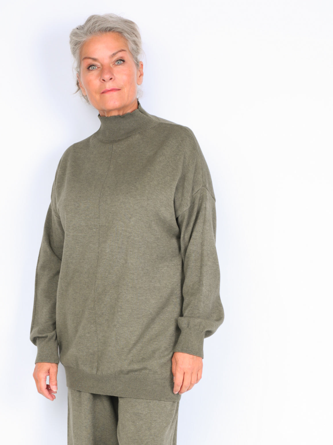 Knitted sweater with high neck