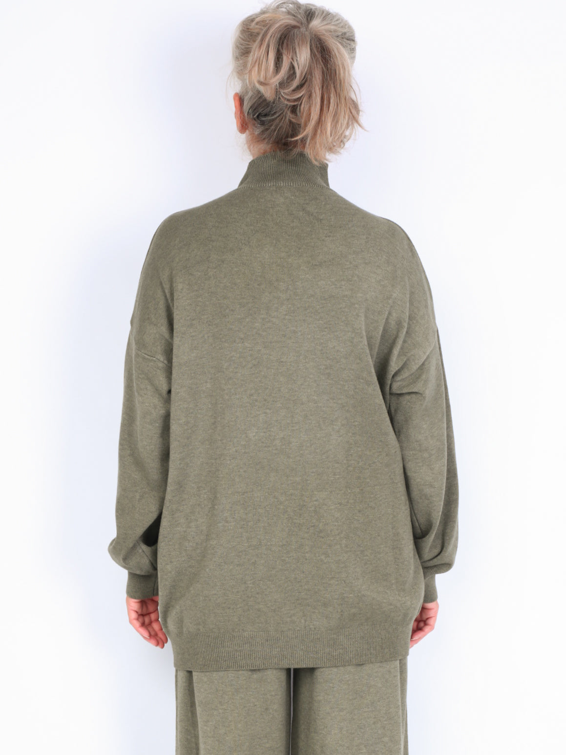 Knitted sweater with high neck