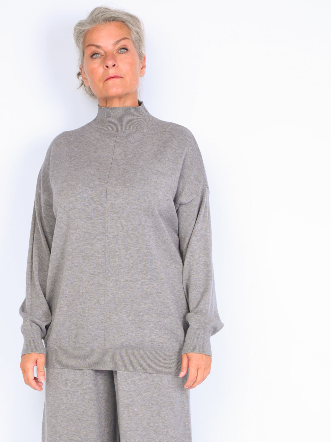 Knitted sweater with high neck