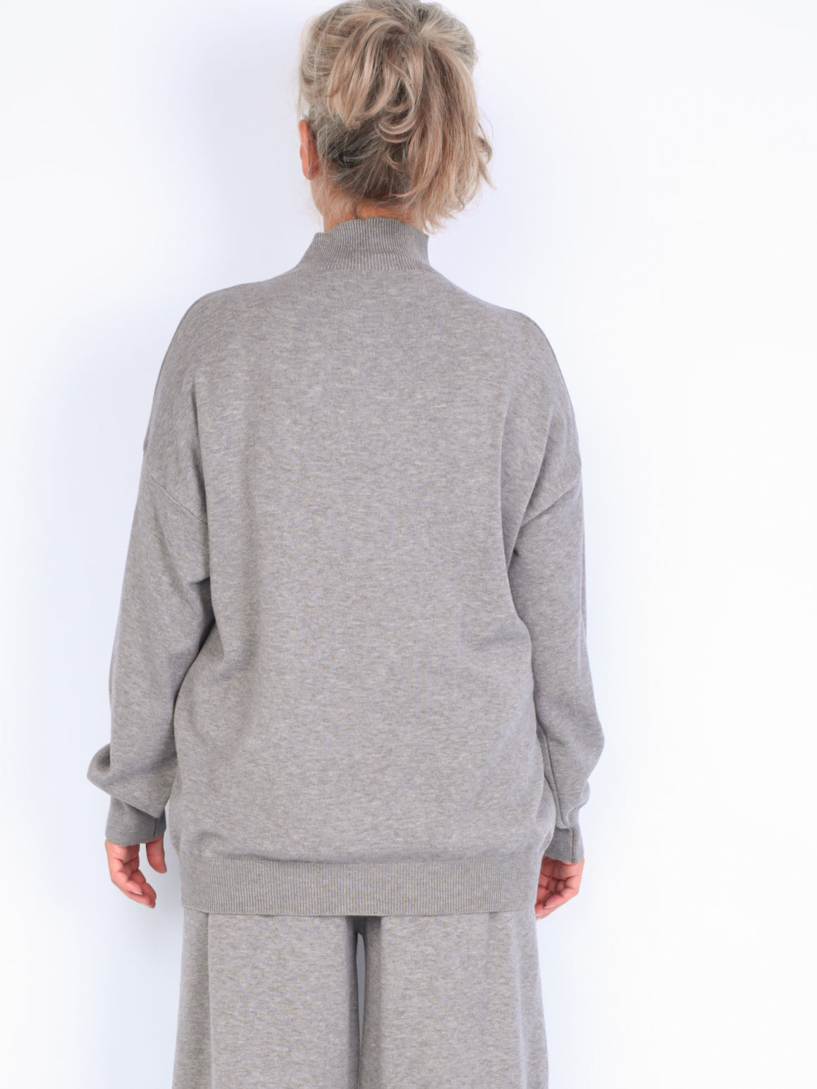Knitted sweater with high neck