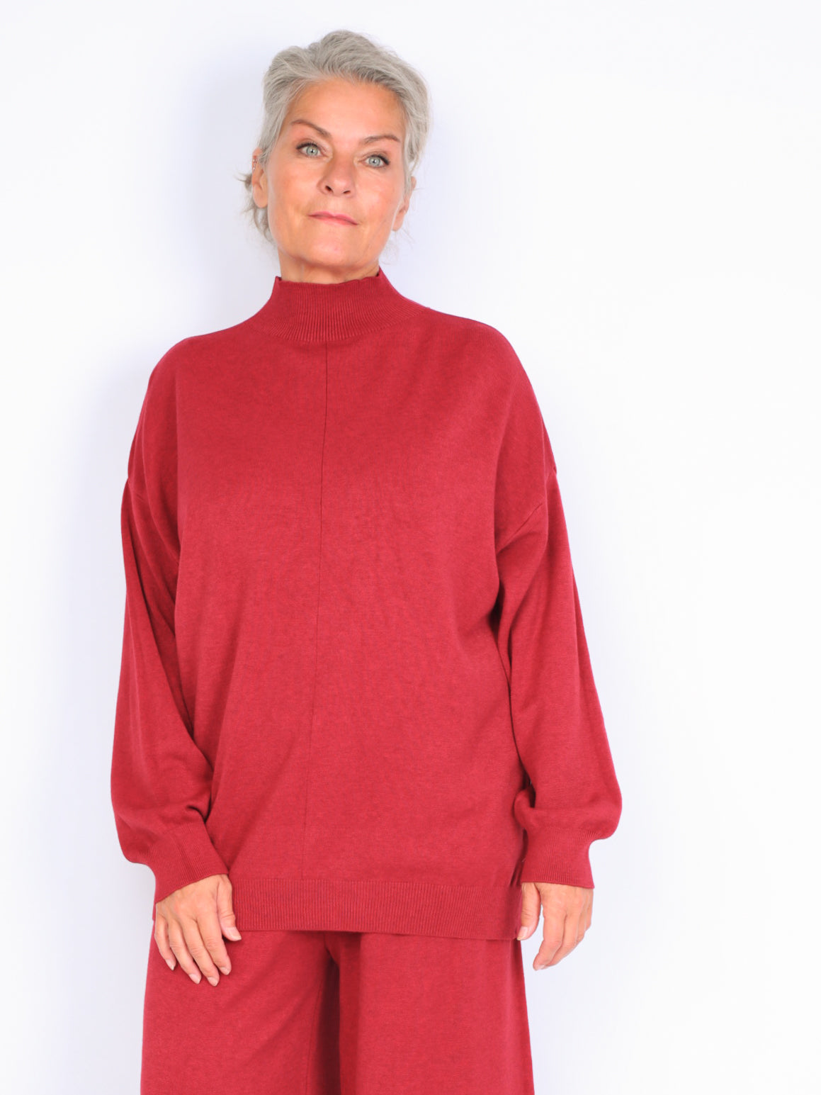 Knitted sweater with high neck