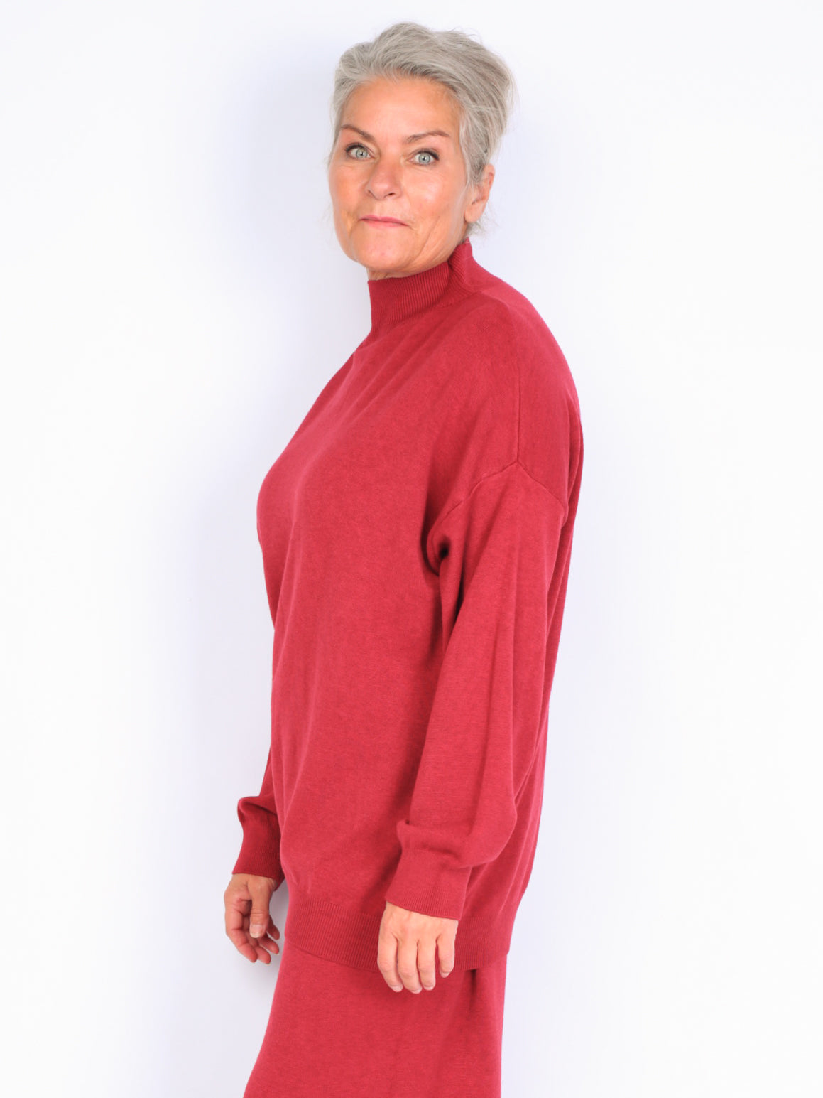 Knitted sweater with high neck