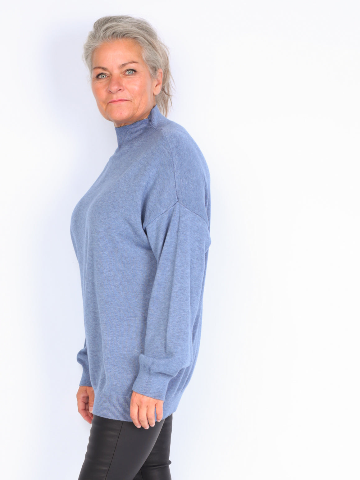 Knitted sweater with high neck