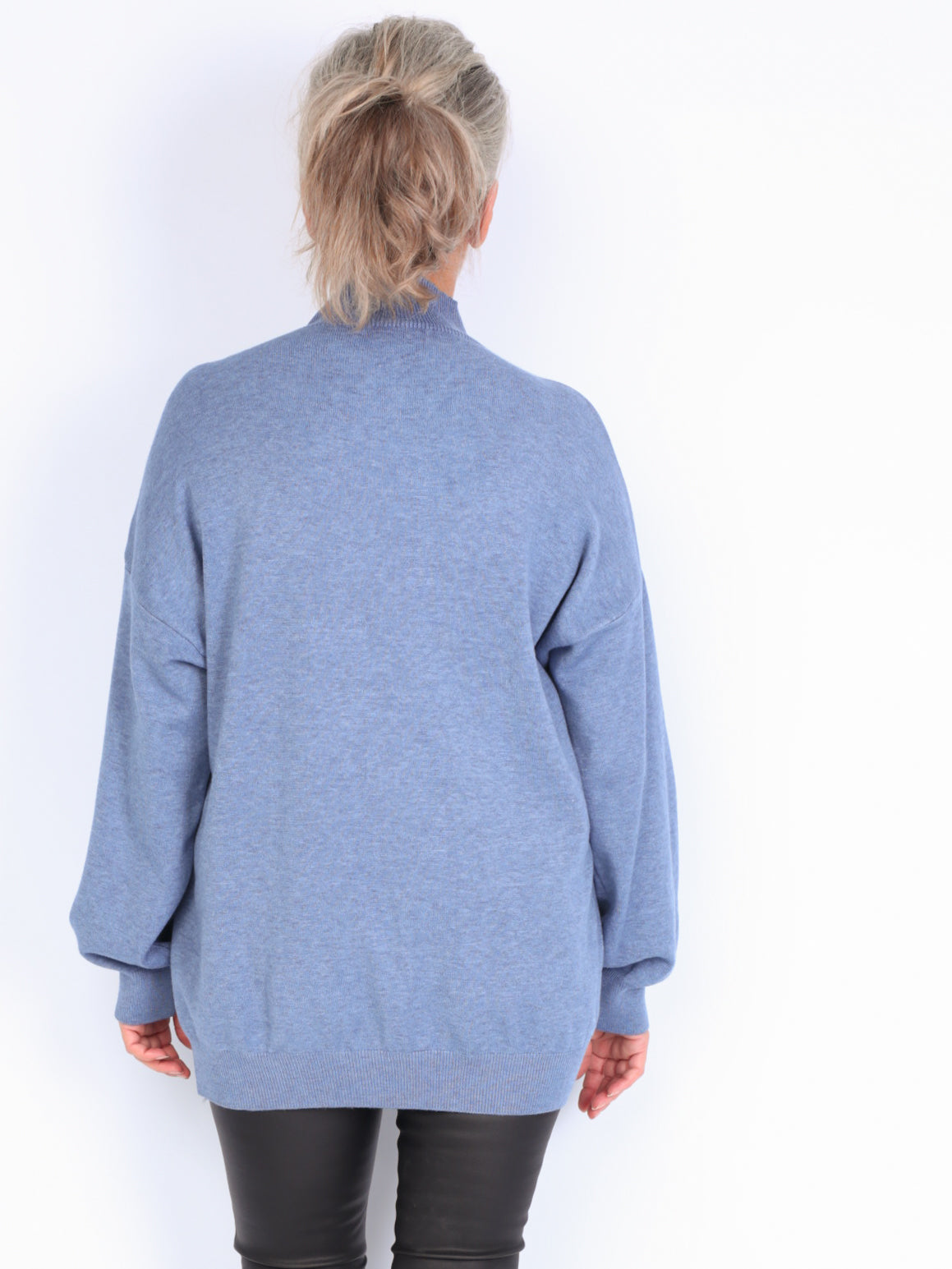 Knitted sweater with high neck