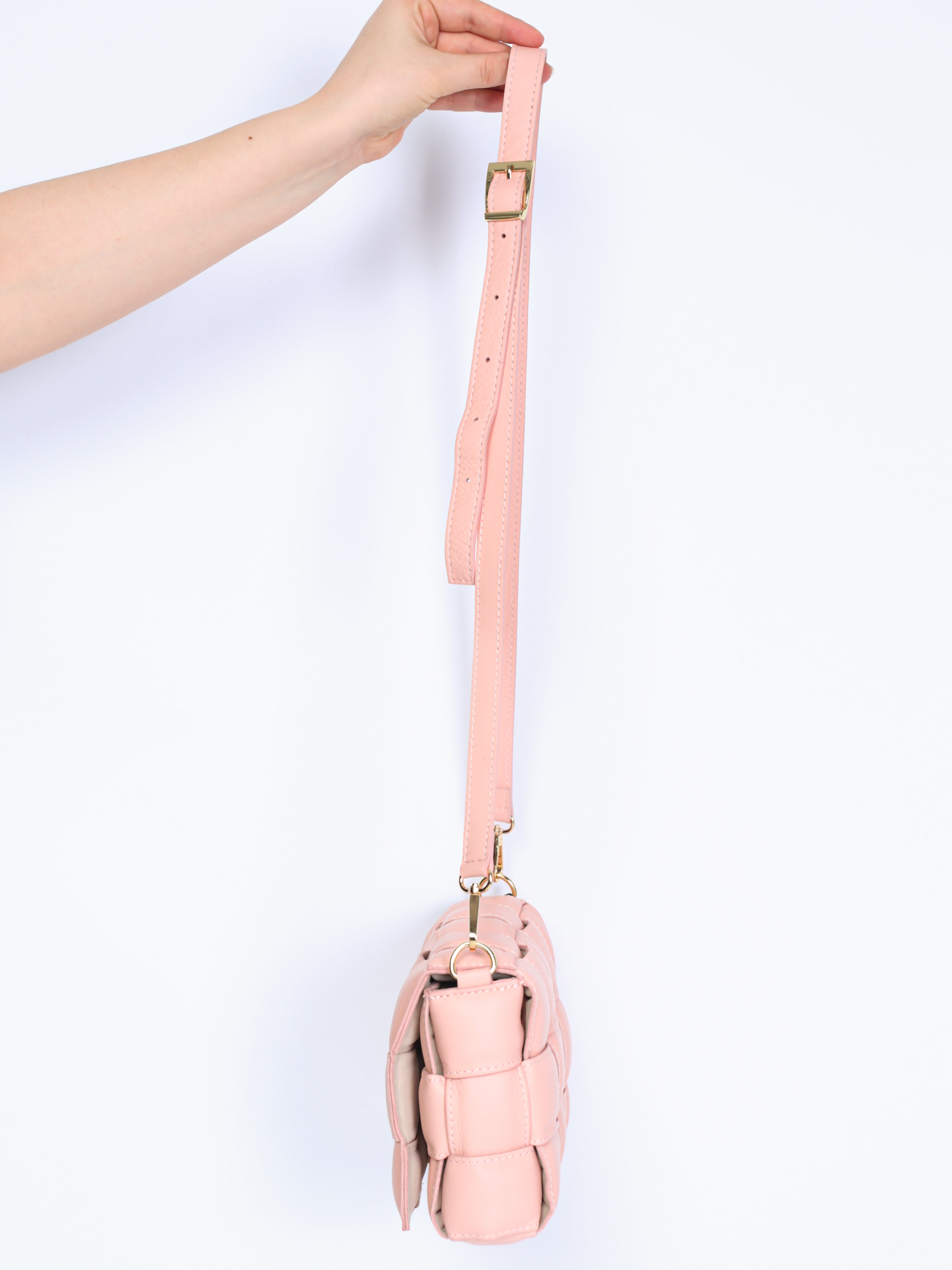 Braided leather bag with gold details
