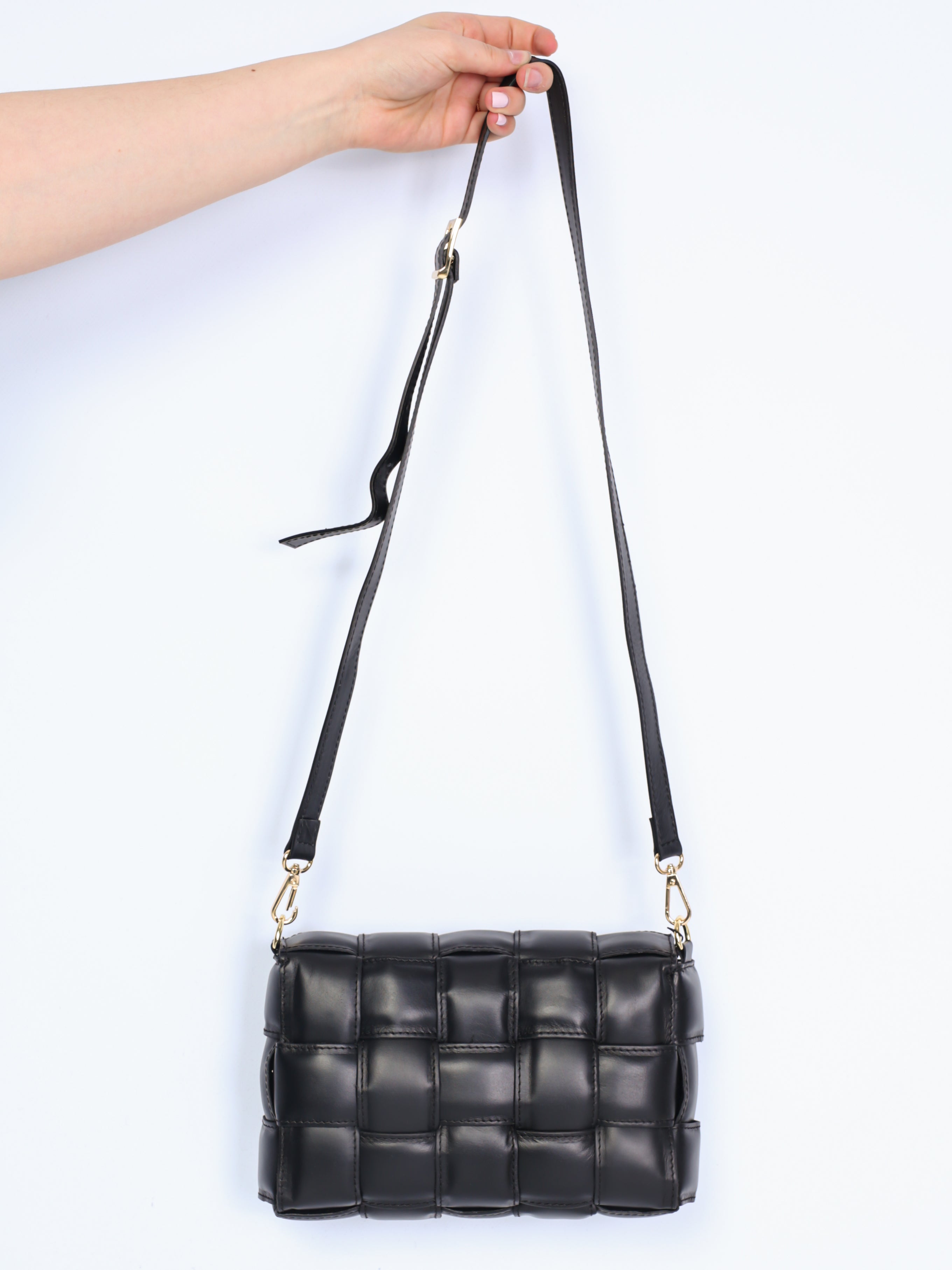 Braided leather bag with gold details