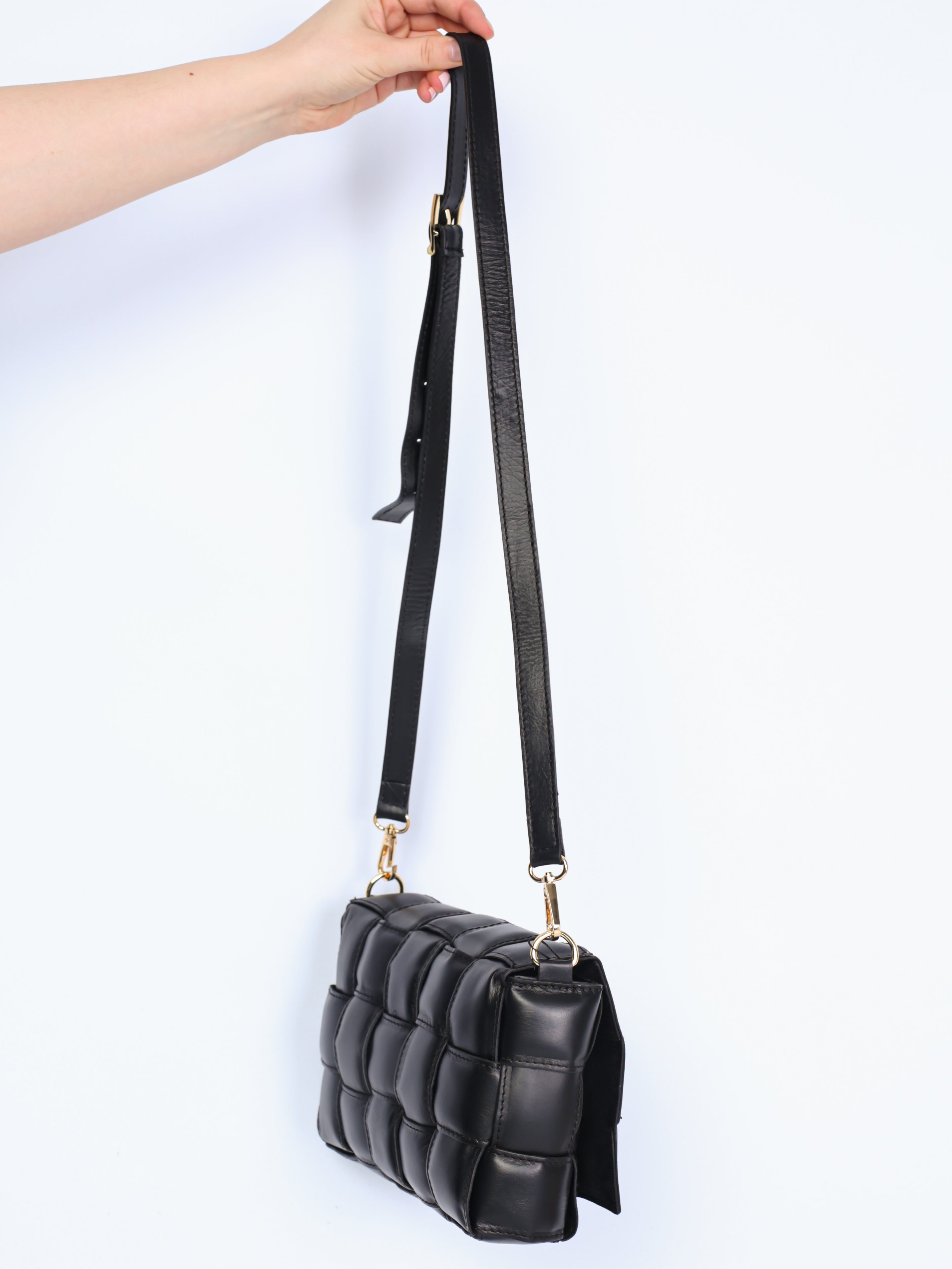 Braided leather bag with gold details