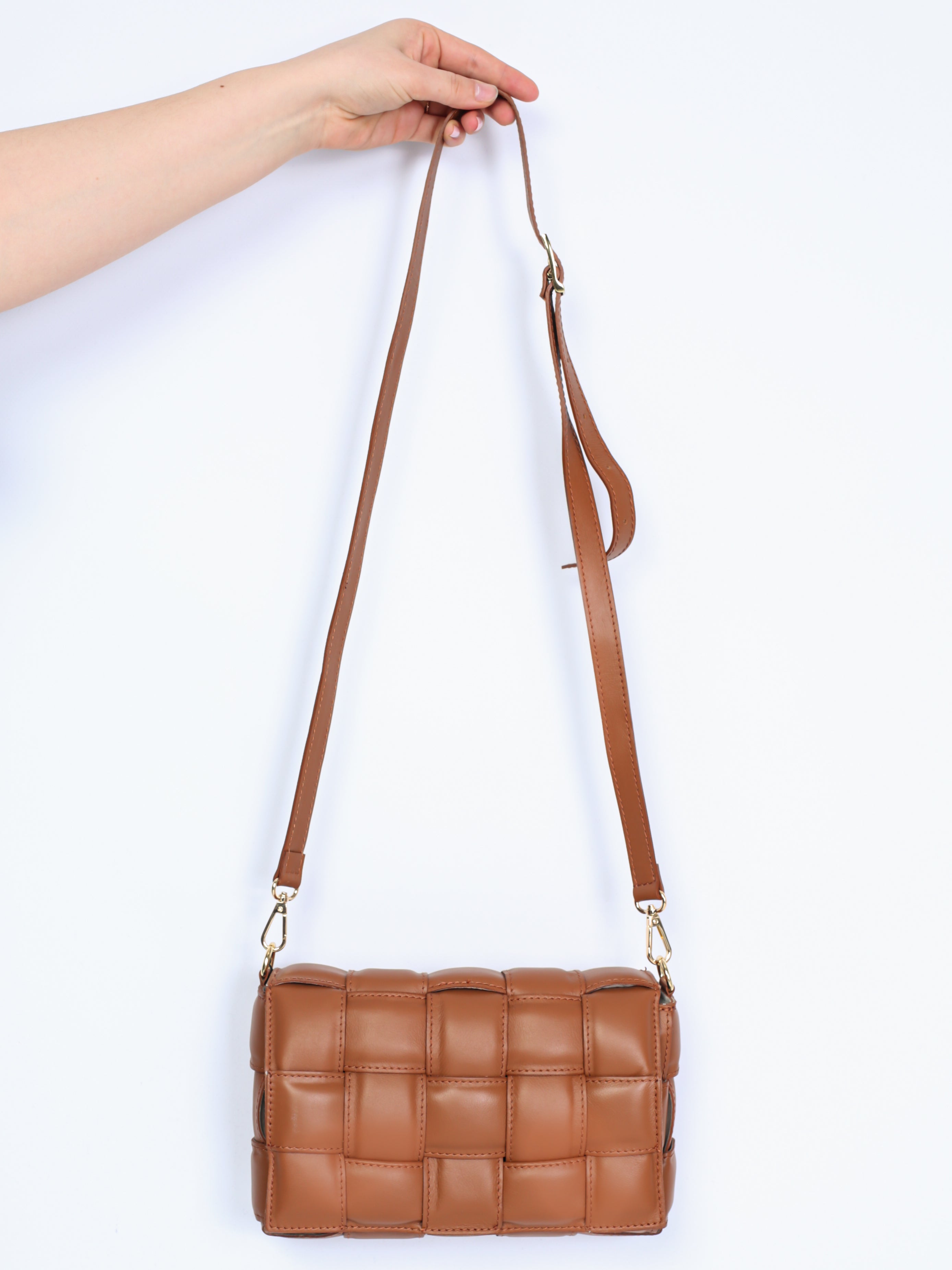 Braided leather bag with gold details