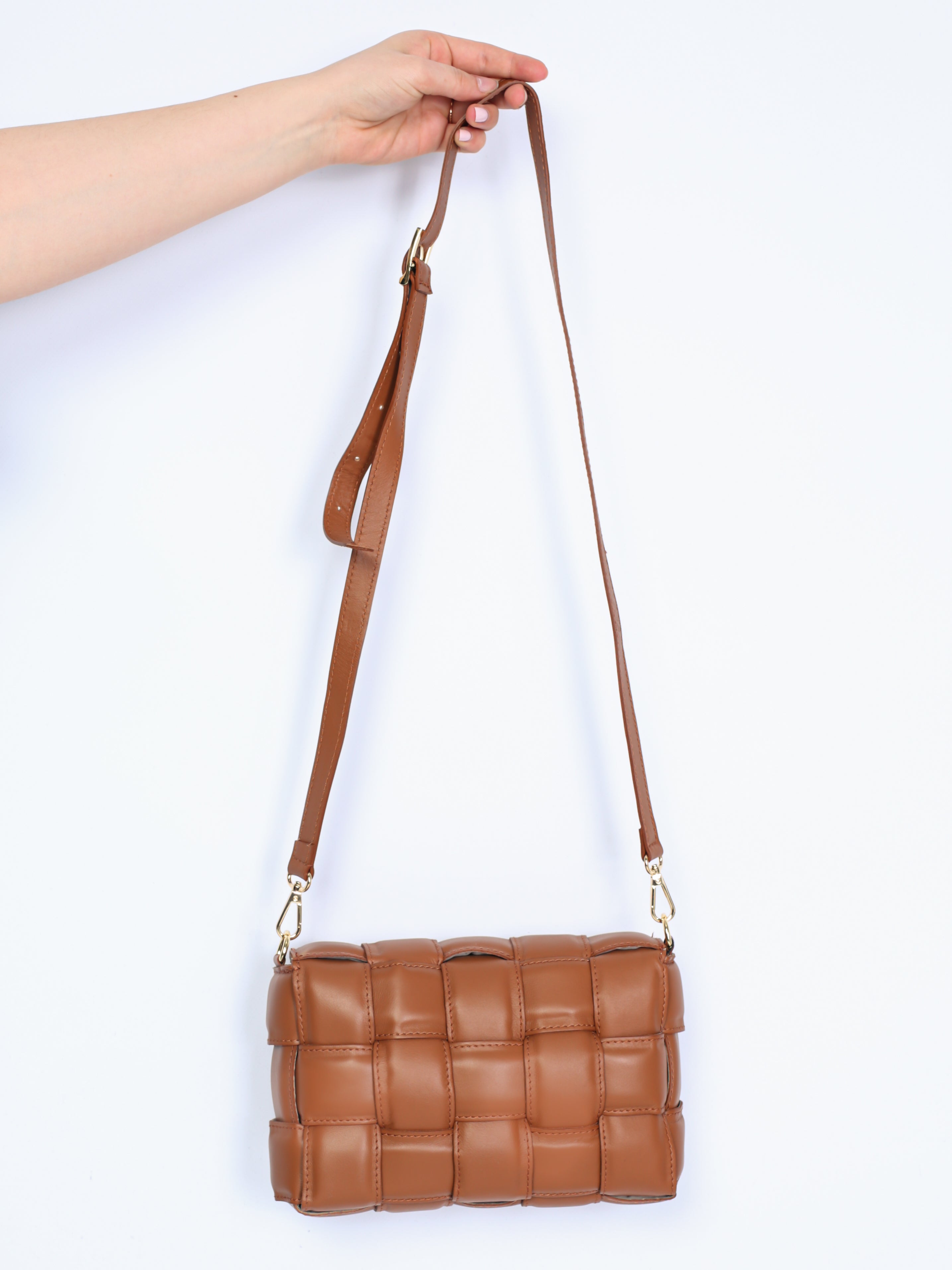 Braided leather bag with gold details