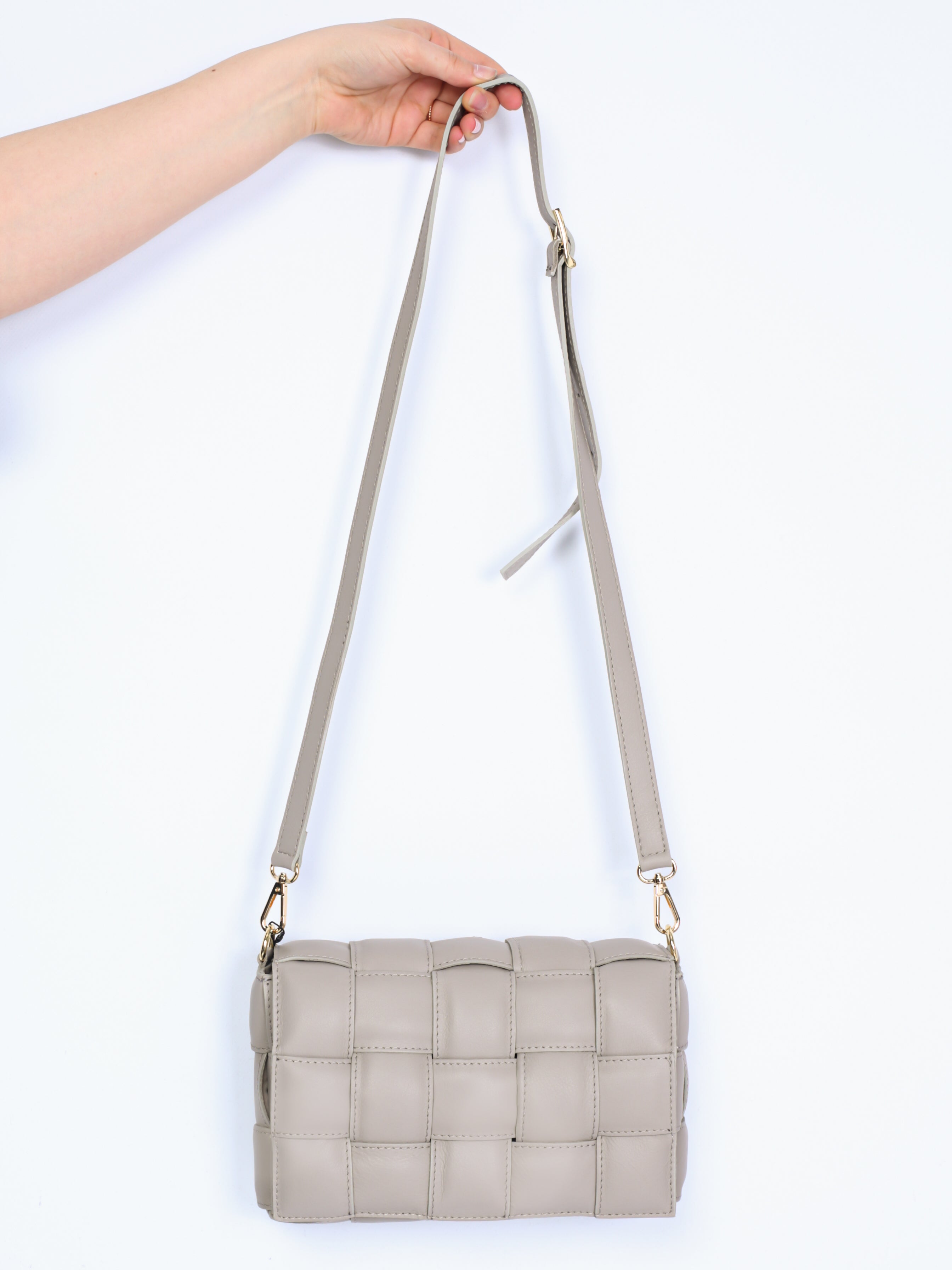 Braided leather bag with gold details