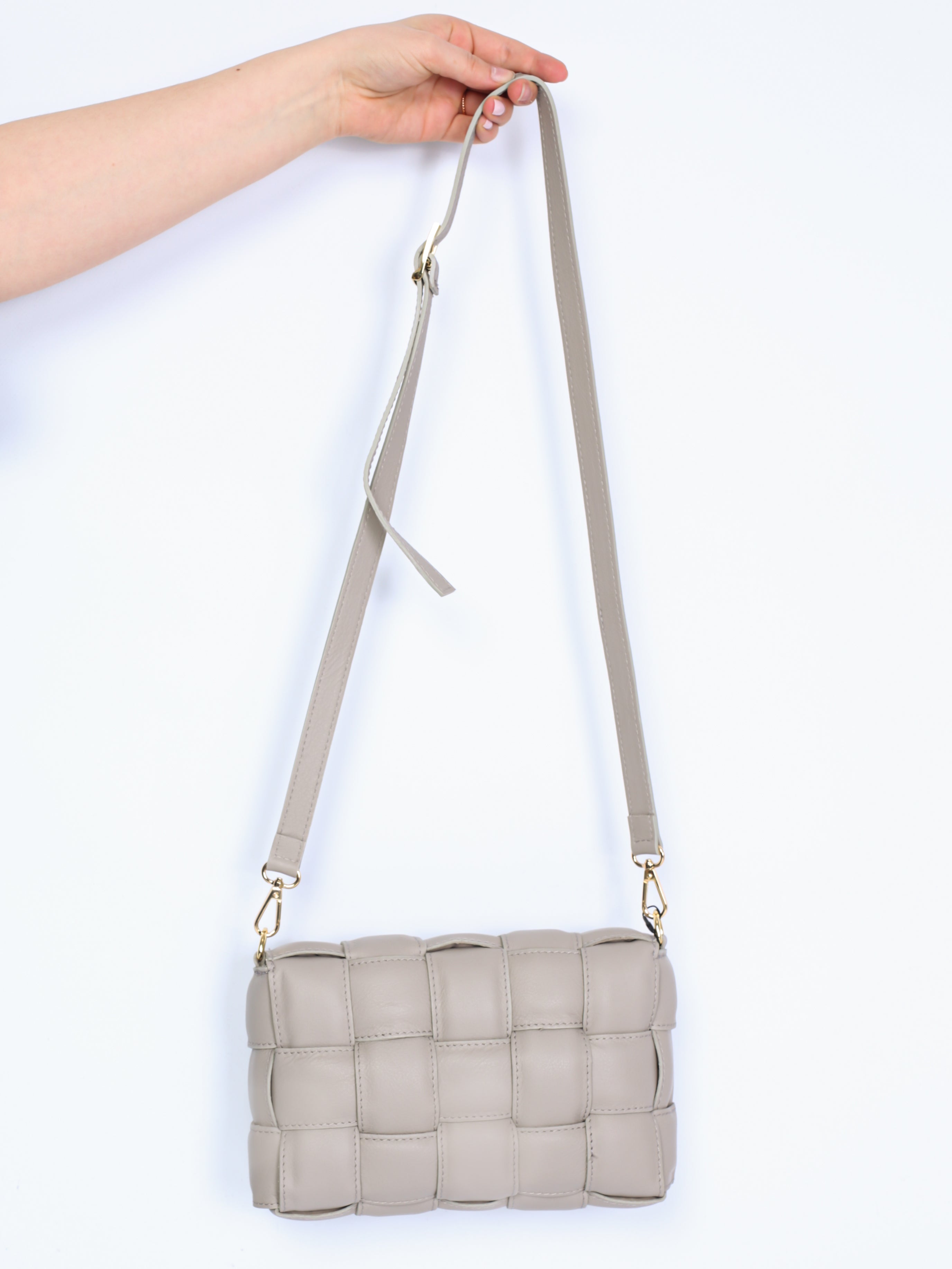 Braided leather bag with gold details