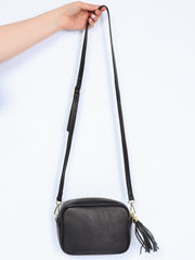 Leather bag with fringe pendant