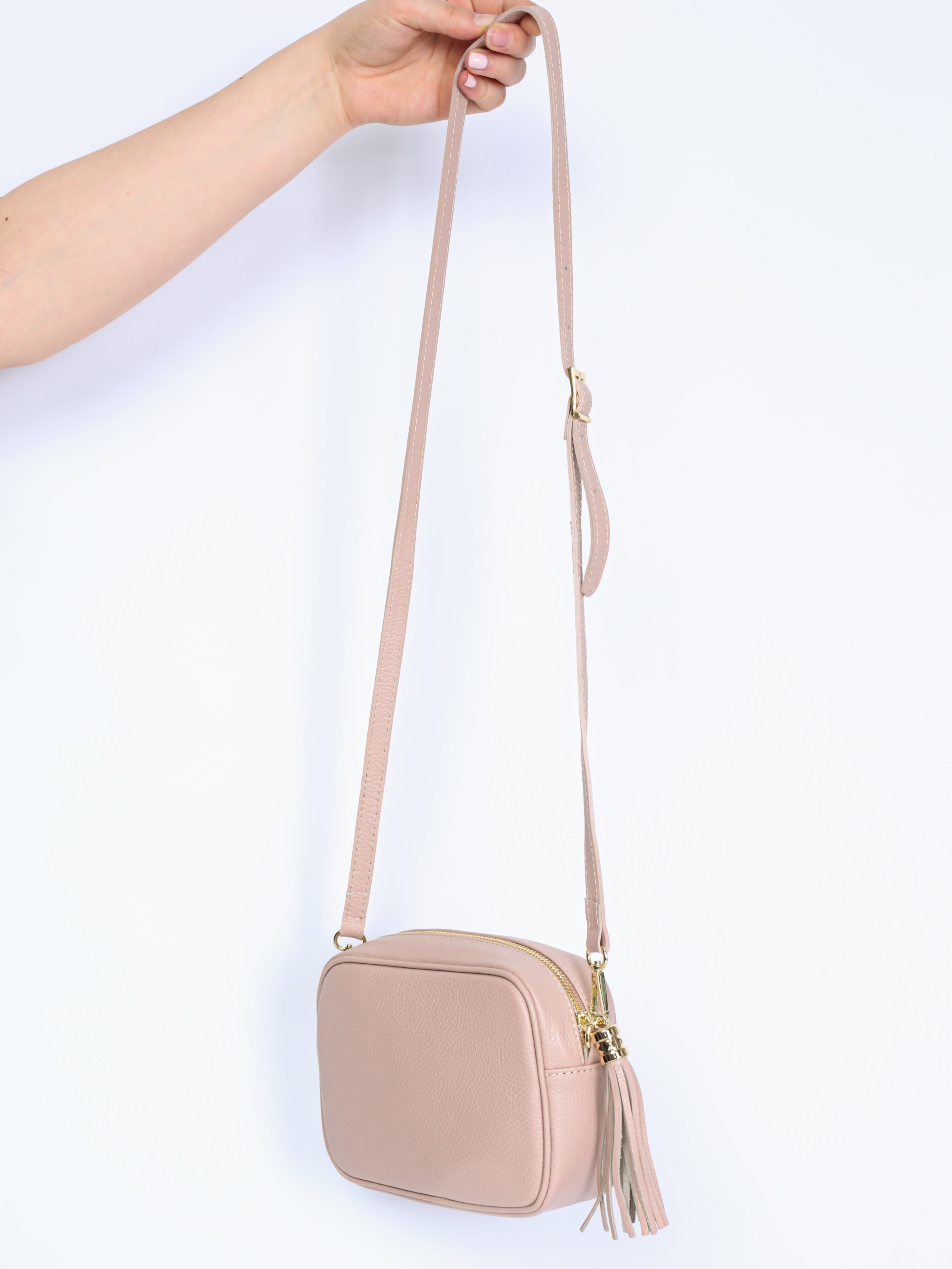 Leather bag with fringe pendant