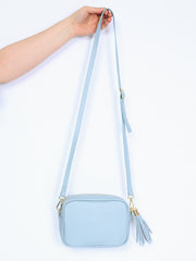 Leather bag with fringe pendant