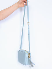 Leather bag with fringe pendant