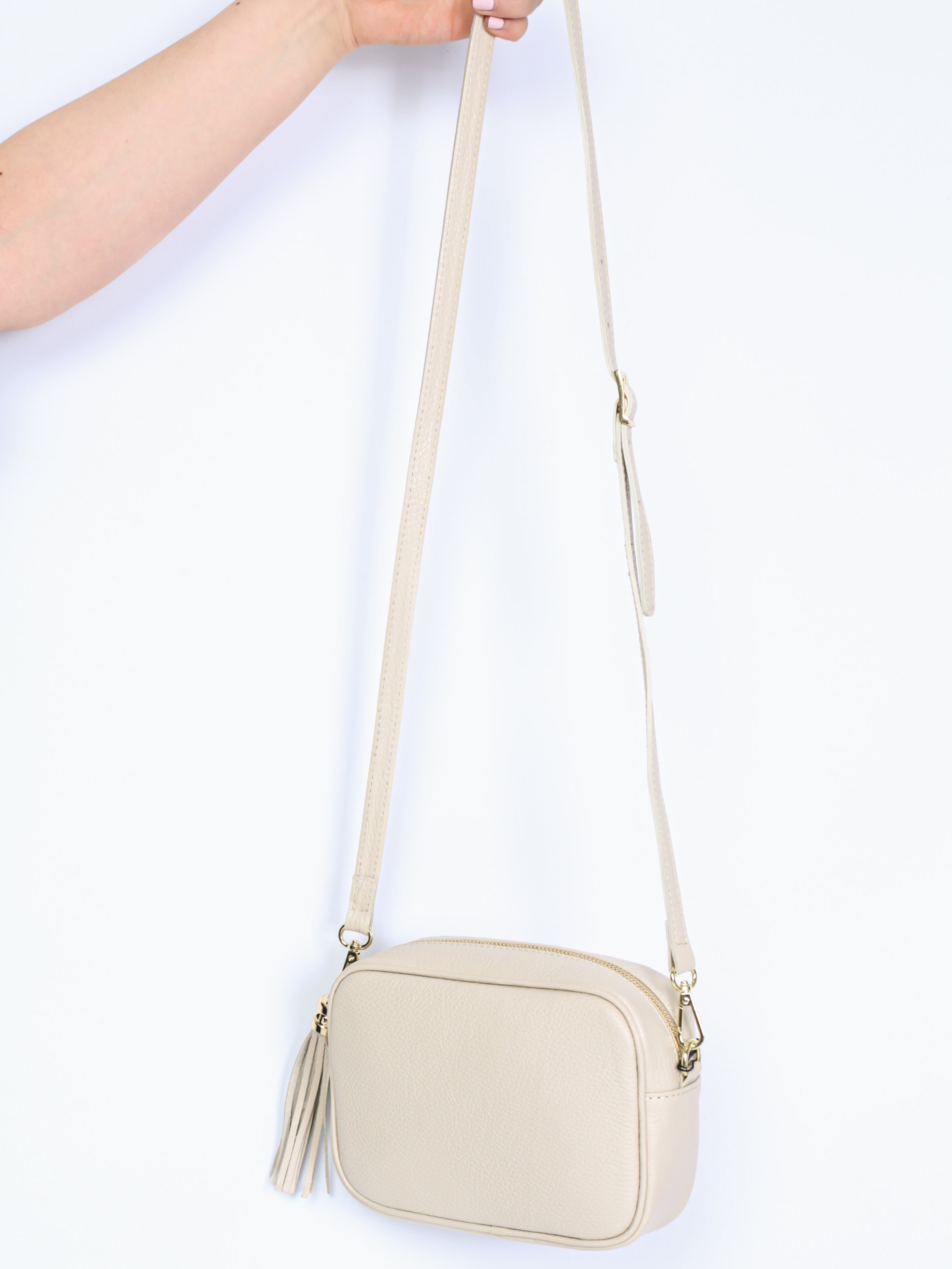 Leather bag with fringe pendant