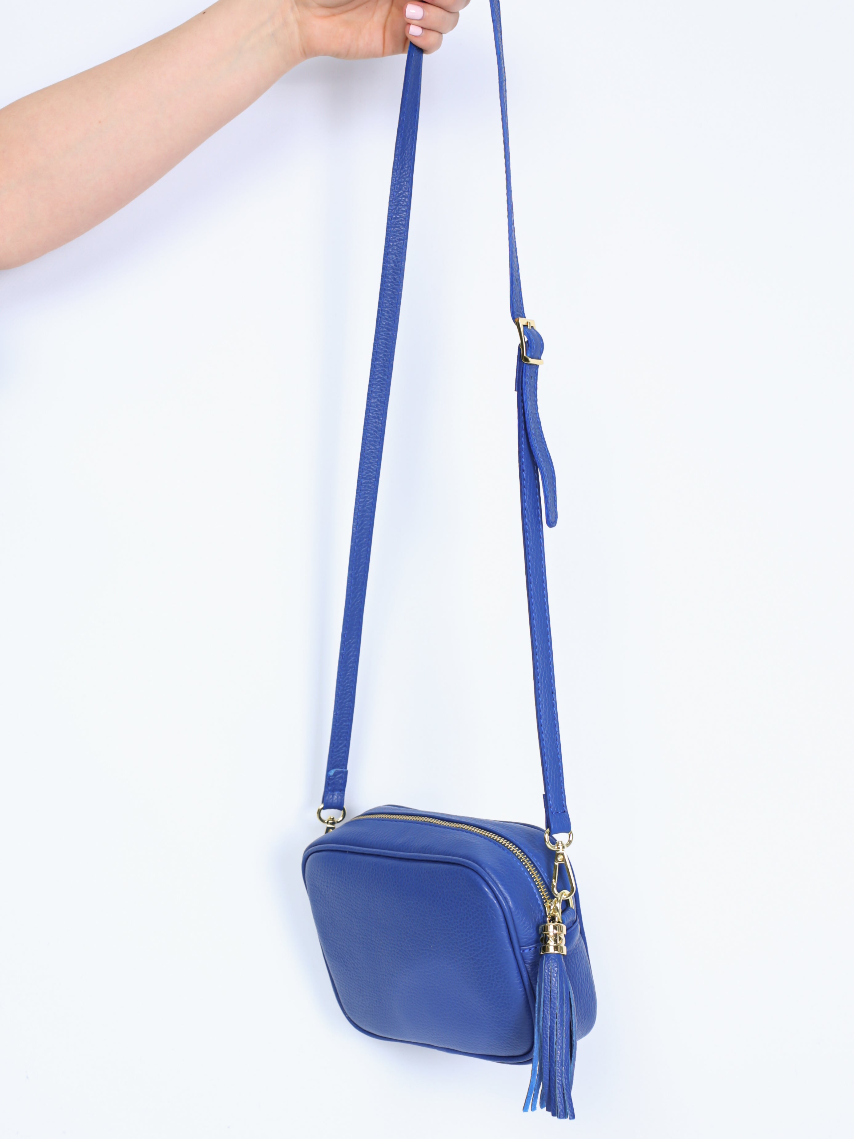 Leather bag with fringe pendant