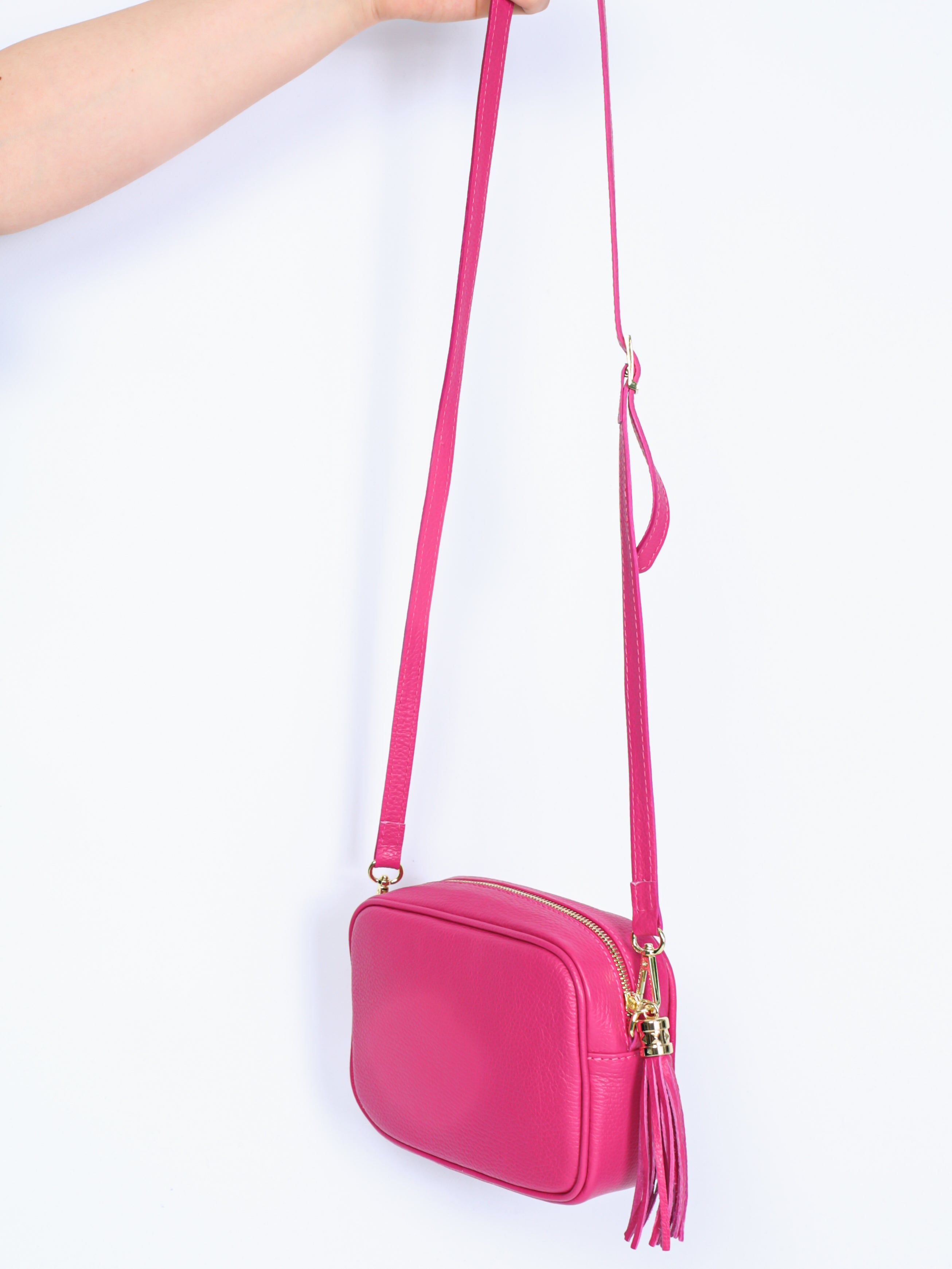 Leather bag with fringe pendant