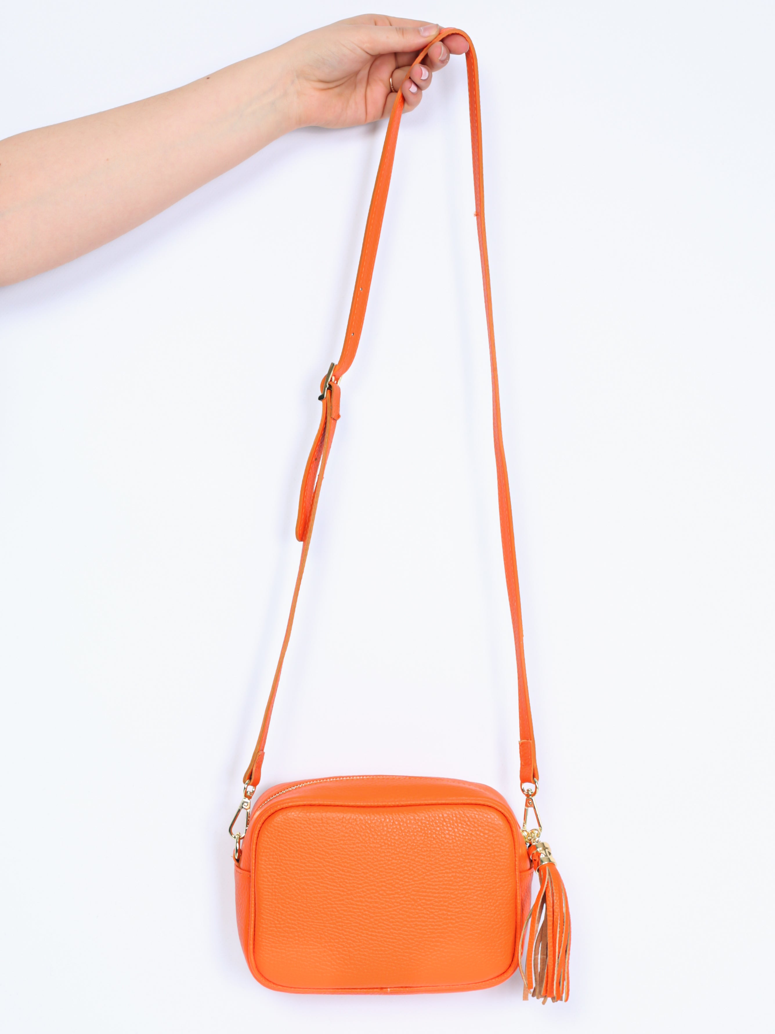 Leather bag with fringe pendant