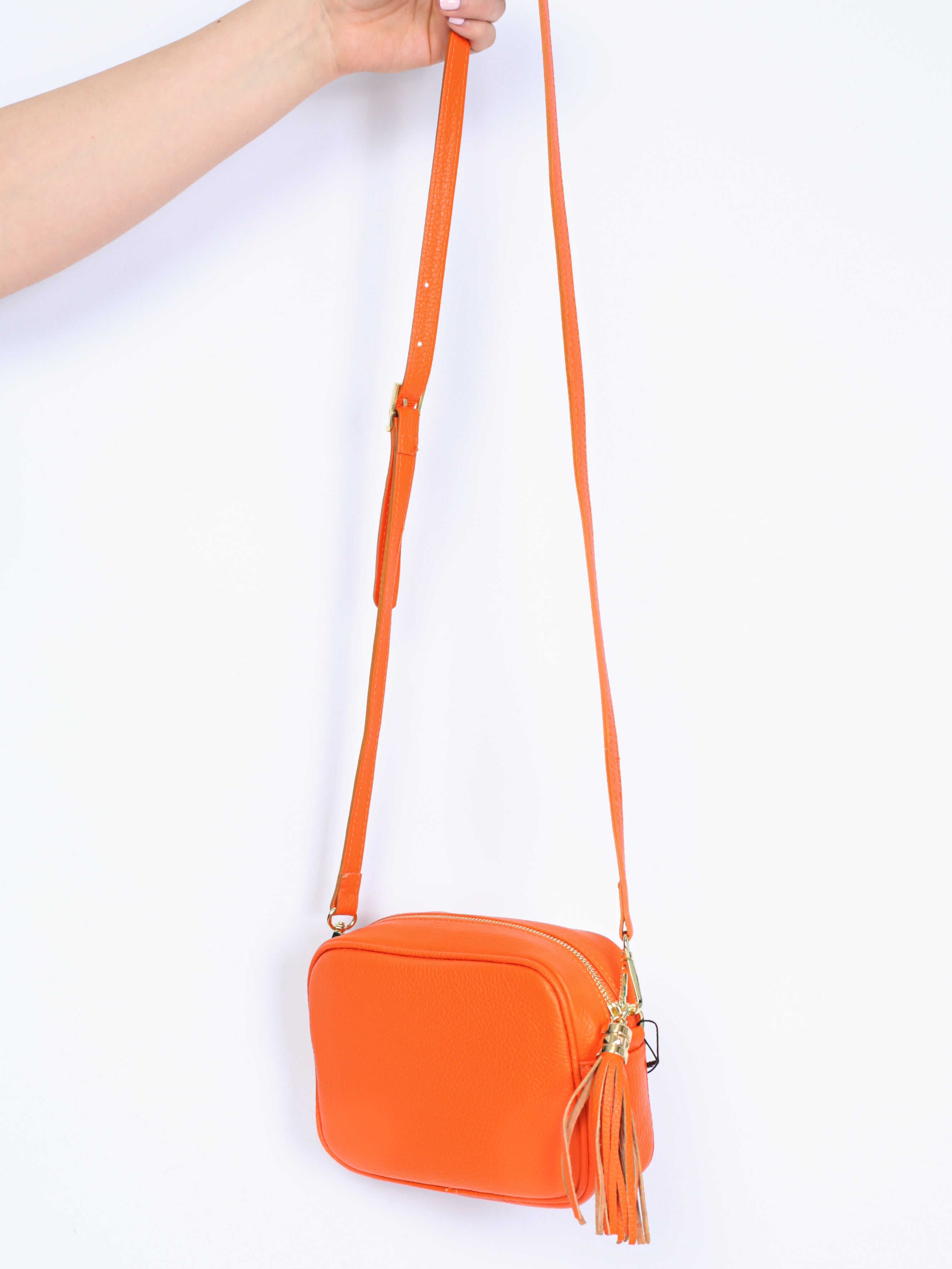 Leather bag with fringe pendant